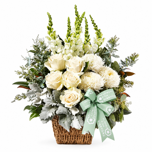 Pure White Flower Basket filled with white roses chrysanthemums and snapdragons with lush foliage for sympathy thank you gifts and same day flower delivery