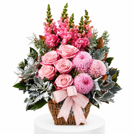Precious Pink Basket filled with pink roses chrysanthemums snapdragons and textured foliage for birthdays thank you gifts or same day flower delivery
